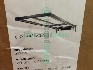 Nine professional Fluence RAZRx LED grow light fixtures arranged for auction sale, showing ultra-slim 1.2-inch profile design with modular aluminum chassis and integrated passive cooling heatsinks, each unit measuring 17.9 to 22.8 inches wide, featuring full-spectrum PhysioSpec LED arrays for commercial horticultural applications