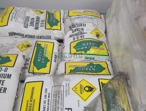 Close-up of sealed Kentucky Green 34-0-0 Ammonium Nitrate Fertilizer packaging showing guaranteed analysis for hydroponics and CEA